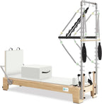 Joyrider B60 Pilates reformer with full tower, white cushion, three-quarter view