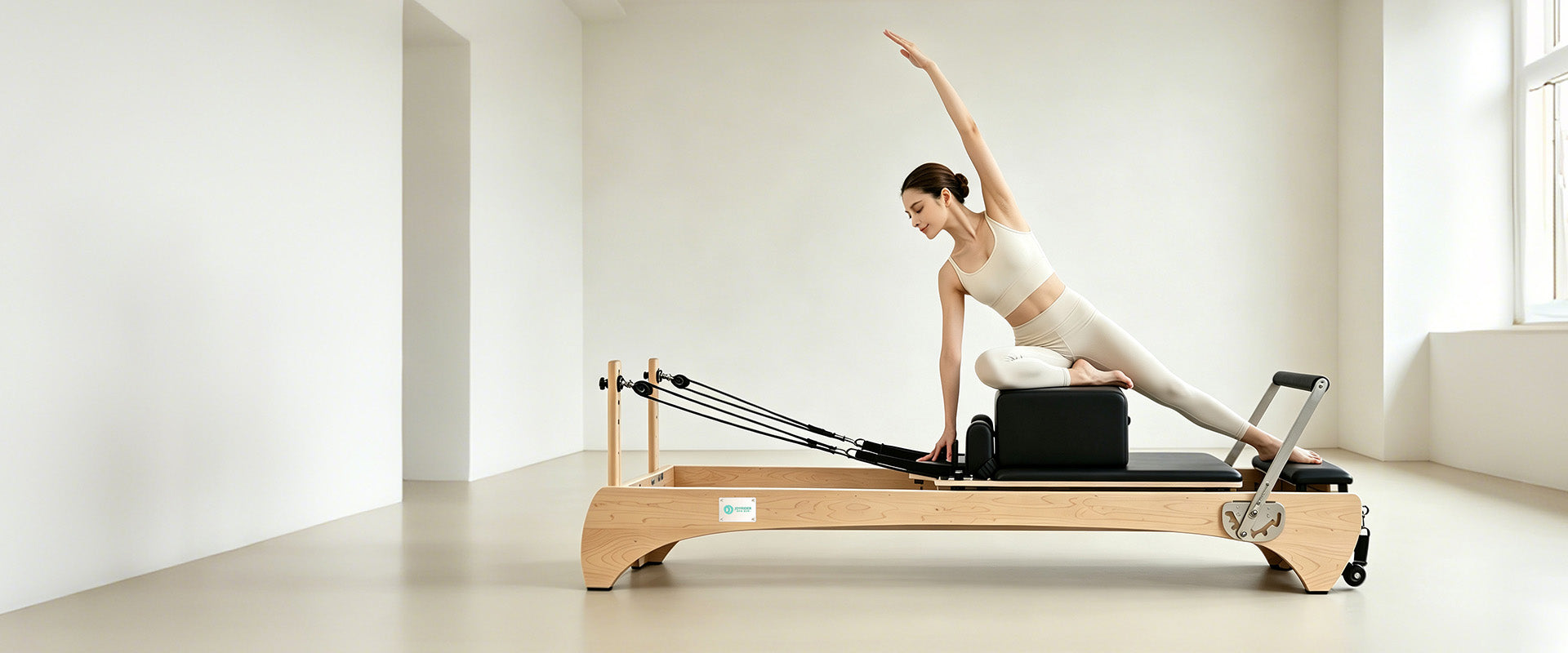 Joyrider Pilates studio reformer in a bright professional Pilates studio